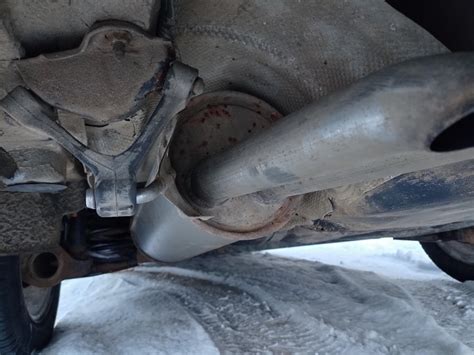 Kipufogótartó csere