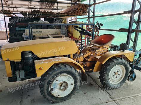 Kistraktor fűkaszával