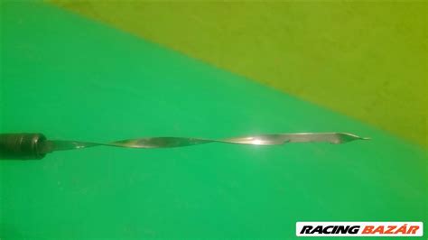 Motorolaj nívópálca